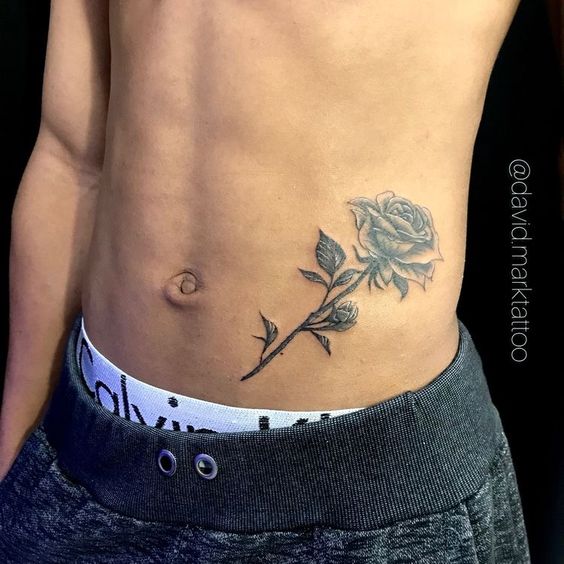 Tatuajes para hombres en el abdomen